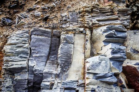 Fragment of sedimentary rock as background texture
