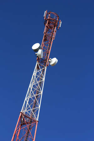 Fragment of the tower of cellular communication on blue