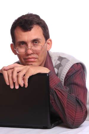 The spectacles thoughtful man with the notebook on whiteの写真素材