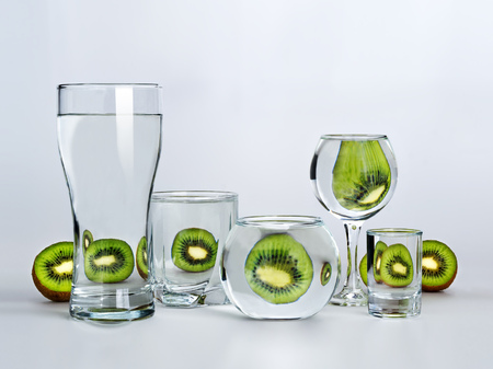 kiwi and glass of waterの写真素材