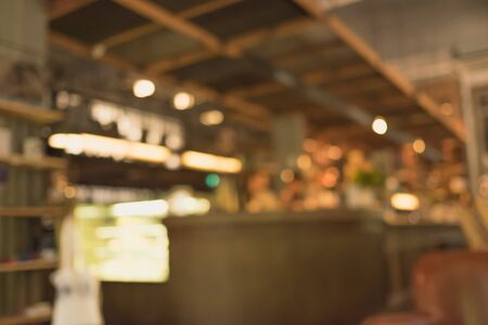 Blur restaurant with light lamp and ceiling as background/Blur restaurant backgroundの写真素材