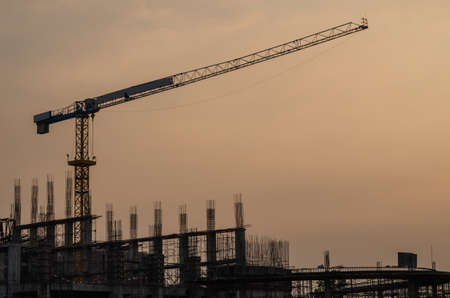 Crane and workplace in the evening