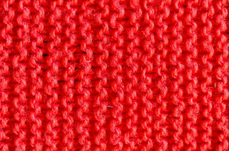 Close up the texture of knitted red cloth.の写真素材