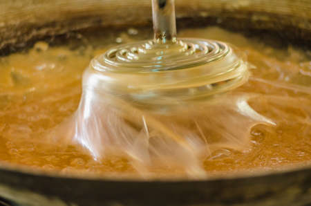 Process of making coconut sugar. Food products in Samut Songkhram province, Thailand. Motion Blur.の写真素材