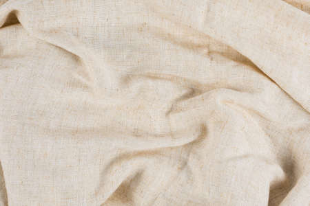 Texture of brown fabric crumpled. Suitable for use background and place text over photo.の写真素材