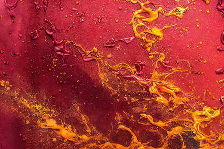 3D rendered computer generated abstract image of maroon and gold oil paint splatters. Chaotic and...