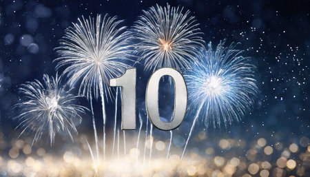 Happy new year and merry christmas celebration concept - silver number 10 on fireworks backgroundの素材