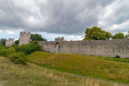 The Visby city wall on the island of Gotland in Sweden. It is the strongest, most extensive, and best preserved medieval city wall in Scandinavia.の写真素材