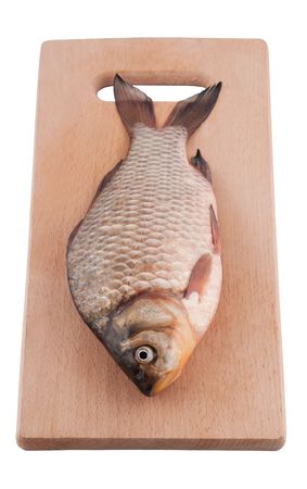 Raw fish on a board.の写真素材