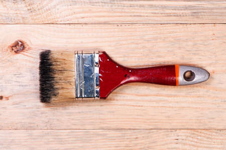 Brush on wooden background.の写真素材