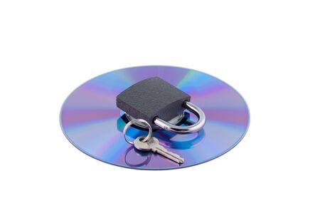 Padlock and key on cd isolated. Concept computer security.の写真素材