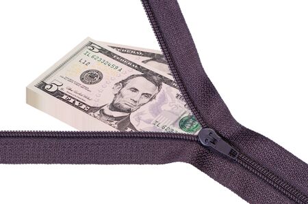 Opened zipper with pile money dollars.