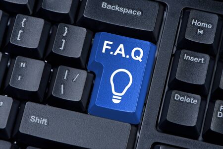 Blue button computer keyboard F.A.Q. internet concept.の写真素材