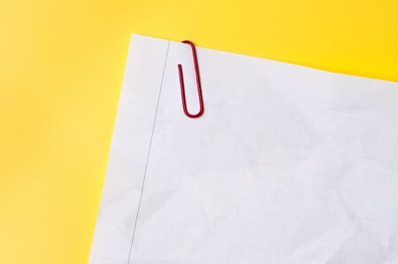 Crumpled sheet and paper clip.