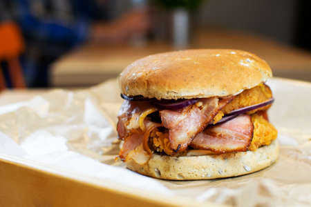 Burger with appetizing fried baconの写真素材