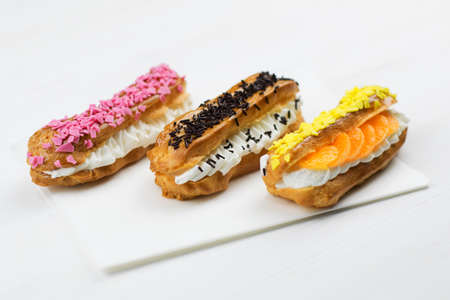 Beautifully decorated eclairsの写真素材