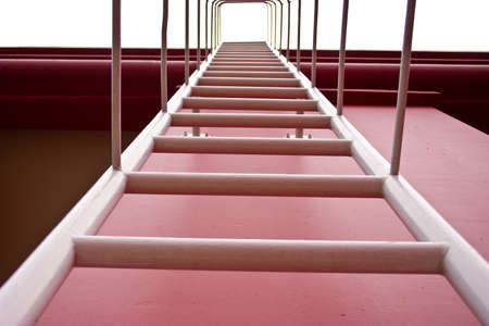 Fixed ladder up to the top of the building の写真素材