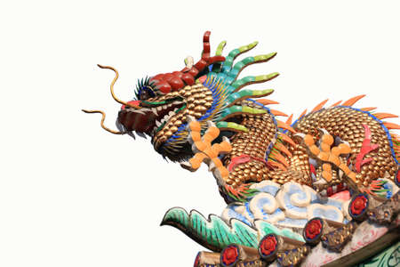 Chinese dragon decorate on temple roof isolated.の写真素材