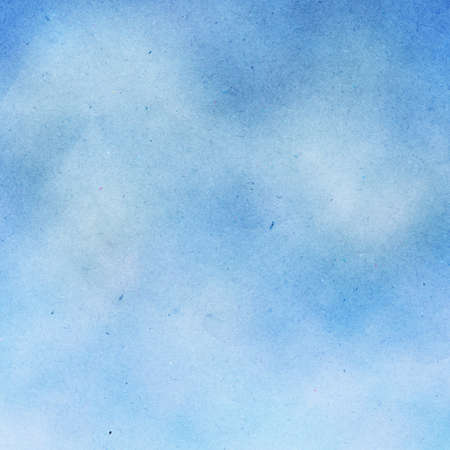 blue sky painted on paper background の写真素材