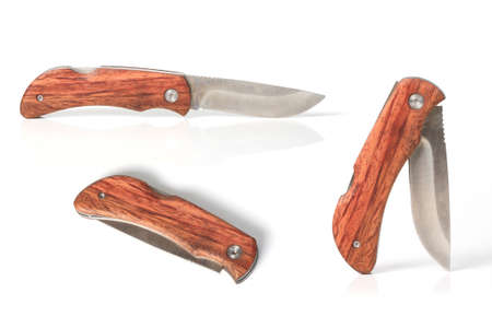 wooden camping knife over white background 