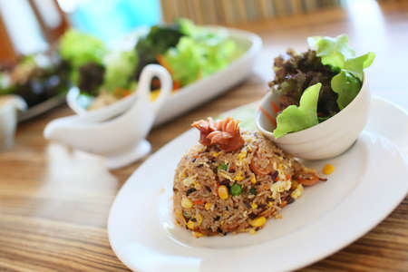 Sausage fried rice and Saladの写真素材