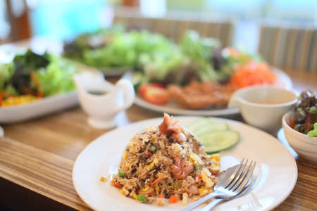 Sausage fried rice and Saladの写真素材