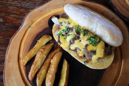 Steak and Cheese Sub with potato fried.の写真素材
