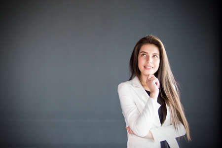 Business woman thinking with copy space.の写真素材