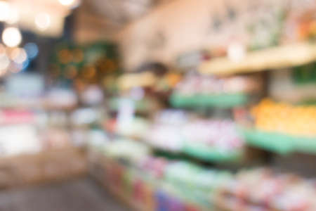 Defocused of shelf, display in supermarket for background.の写真素材