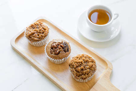 Banana crumble cup cake with tea.