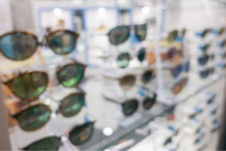 Blurred Sunglasses shop for background.の写真素材