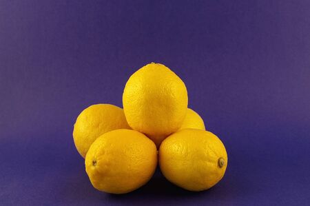 A horizontal shot of yellow lemonsの写真素材