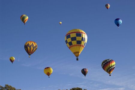 An image of several rising  hot air balloons.の写真素材