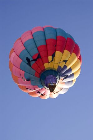 A shot of a hot air balloon floating overhead.の写真素材