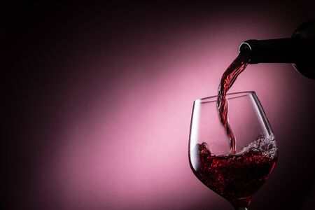 Pour the red wineの写真素材