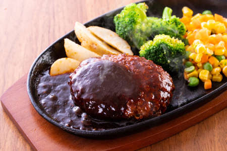 Eat hamburger steak at a restaurantの写真素材