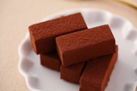 Raw chocolate on beige tableclothの写真素材
