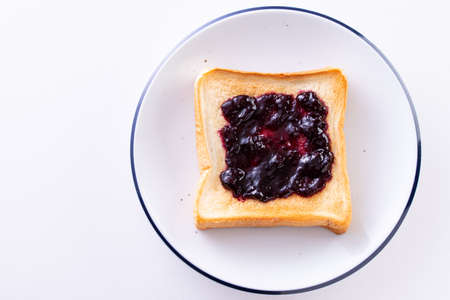 Toast with blueberry jamの写真素材