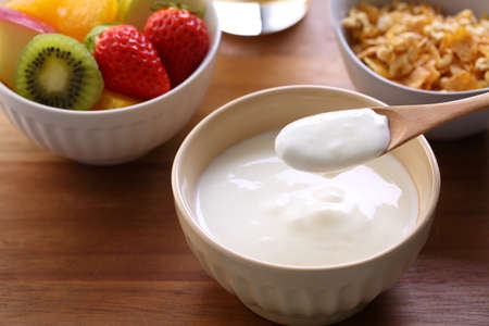 eat yogurt for breakfastの写真素材
