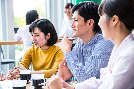 Young employees meeting at the companyの写真素材