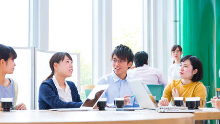 Young employees meeting at the companyの写真素材