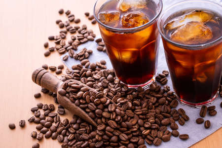 Iced coffee and coffee beans