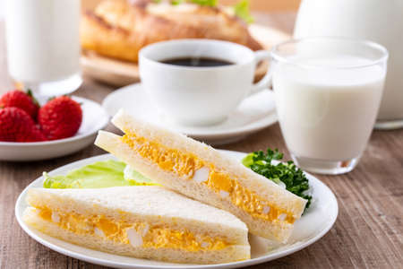 eat egg sandwiches for breakfastの写真素材