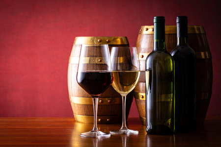 Two glasses of wine and a barrelの写真素材