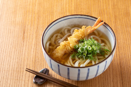 Japanese ramen noodle with shrimps tempura on wooden tableの写真素材