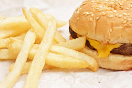 Fast food meal with cheeseburger and friesの写真素材