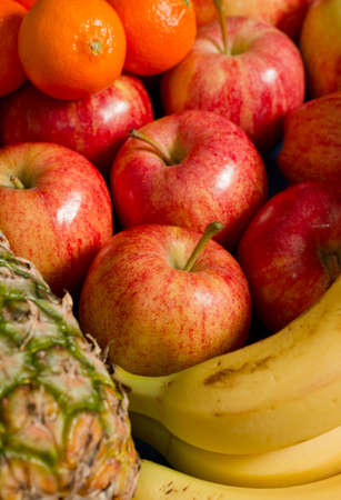 Mix fresh fruits. Pineapple,apples,orange and banana.