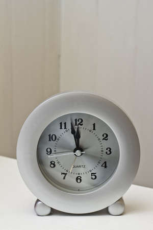 Clock at noonの写真素材