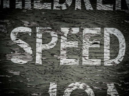 Speed on old weathered signの写真素材