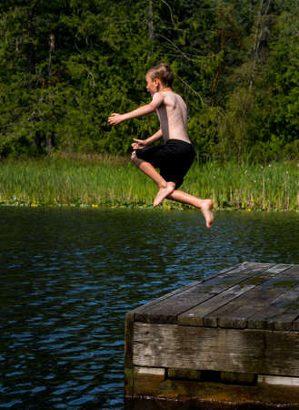 Jump into the lakeの写真素材